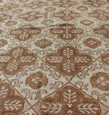All - Over Blossom and Palmette Design Vintage Turkish Oushak Rug in Brown Tones Measures: 4'4 x 7'7. This Oushak carpet (circa mid - 20th century) features an all - over pattern of interconnected, vertically - arranged blossom and palmette motif... - Keivan Woven ArtsTU - TRS - 3254 - 6201Rug