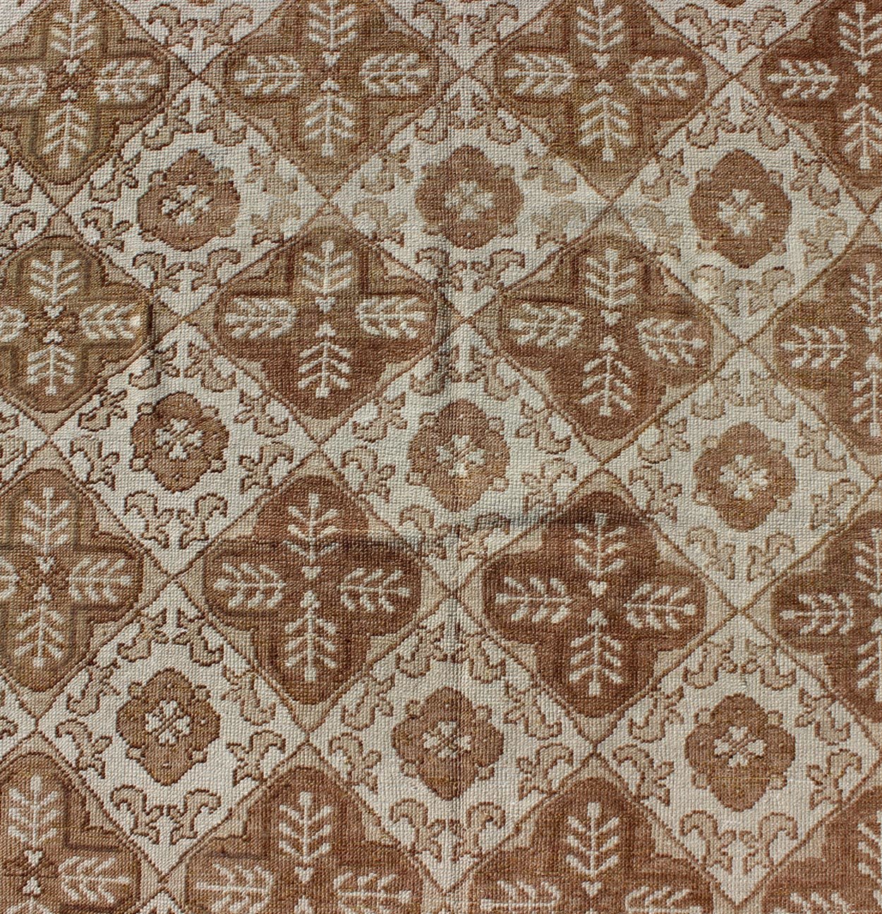 All - Over Blossom and Palmette Design Vintage Turkish Oushak Rug in Brown Tones Measures: 4'4 x 7'7. This Oushak carpet (circa mid - 20th century) features an all - over pattern of interconnected, vertically - arranged blossom and palmette motif... - Keivan Woven ArtsTU - TRS - 3254 - 6201Rug