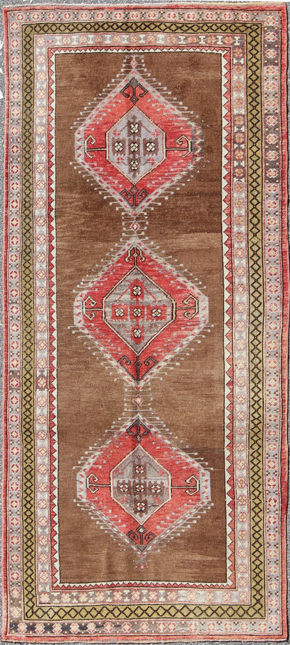Vintage Turkish Oushak Rug with Three Large Medallions and Multiple Borders This beautiful vintage Oushak runner from mid - 20th century Turkey features a Classic Oushak design, which is enhanced by its lustrous wool. The faint brown ground is hom... - Keivan Woven ArtsTU - TRS - 3432 - 5920Rug