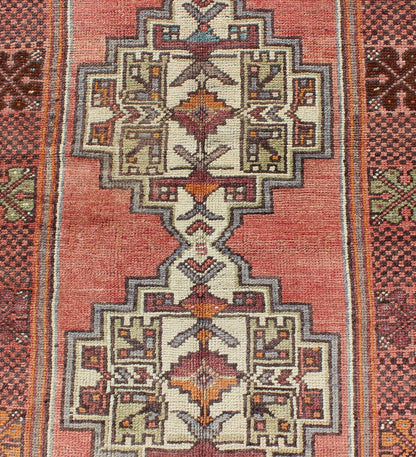 Soft red and green vintage Turkish Oushak rug with sub - geometric dual medallions. Keivan Woven Arts / rug TU - TRS - 3435, country of origin / type: Turkey / Oushak, circa 1940 Measures: 3'9 x 7'9. This Turkish rug features a dual central medallion d... - Keivan Woven ArtsTU - TRS - 3435 - 5854Rug