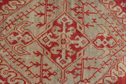 Antique Turkish Oushak rug in delicate red background and light blue border, Rug / TU - TRS - 3472, Antique Oushak Circa 1910 This lovely antique Oushak showcases an elegant medallion design with four cornices that hold the field. The background... - Keivan Woven ArtsTU - TRS - 3472 - 6919Rug