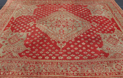 Antique Turkish Oushak rug in delicate red background and light blue border, Rug / TU - TRS - 3472, Antique Oushak Circa 1910 This lovely antique Oushak showcases an elegant medallion design with four cornices that hold the field. The background... - Keivan Woven ArtsTU - TRS - 3472 - 6919Rug