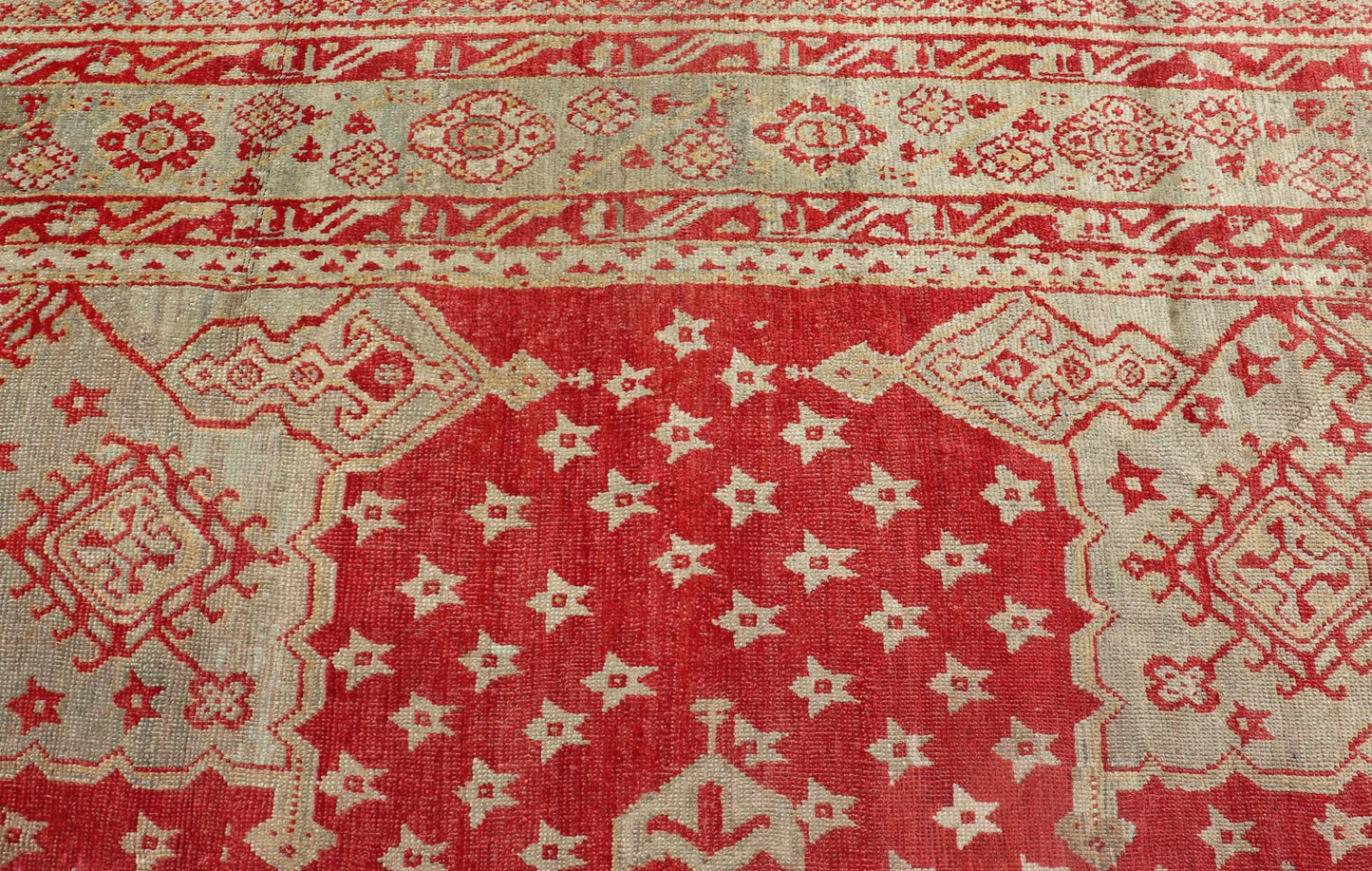 Antique Turkish Oushak rug in delicate red background and light blue border, Rug / TU - TRS - 3472, Antique Oushak Circa 1910 This lovely antique Oushak showcases an elegant medallion design with four cornices that hold the field. The background... - Keivan Woven ArtsTU - TRS - 3472 - 6919Rug