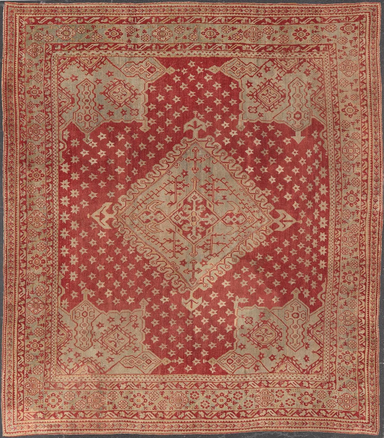 Antique Turkish Oushak rug in delicate red background and light blue border, Rug / TU - TRS - 3472, Antique Oushak Circa 1910 This lovely antique Oushak showcases an elegant medallion design with four cornices that hold the field. The background... - Keivan Woven ArtsTU - TRS - 3472 - 6919Rug