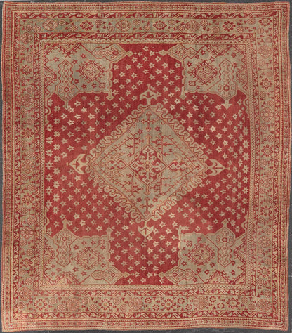 Antique Turkish Oushak rug in delicate red background and light blue border, Rug / TU - TRS - 3472, Antique Oushak Circa 1910 This lovely antique Oushak showcases an elegant medallion design with four cornices that hold the field. The background... - Keivan Woven ArtsTU - TRS - 3472 - 6919Rug