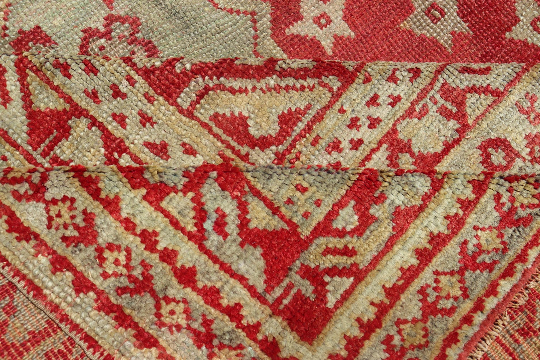 Antique Turkish Oushak rug in delicate red background and light blue border, Rug / TU - TRS - 3472, Antique Oushak Circa 1910 This lovely antique Oushak showcases an elegant medallion design with four cornices that hold the field. The background... - Keivan Woven ArtsTU - TRS - 3472 - 6919Rug