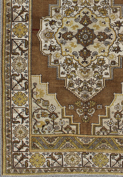 Mocha brown, chartreuse vintage Turkish Oushak rug with ornate floral medallion, Keivan Woven Arts / rug tu - TRS - 3473, country of origin / type: Turkey / Oushak, circa 1940. Measures: 6'4 x 9'11. This vintage, mid century Turkish Oushak ru... - Keivan Woven ArtsTU - TRS - 3473 - 6925Rug