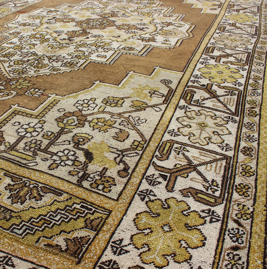 Mocha brown, chartreuse vintage Turkish Oushak rug with ornate floral medallion, Keivan Woven Arts / rug tu - TRS - 3473, country of origin / type: Turkey / Oushak, circa 1940. Measures: 6'4 x 9'11. This vintage, mid century Turkish Oushak ru... - Keivan Woven ArtsTU - TRS - 3473 - 6925Rug
