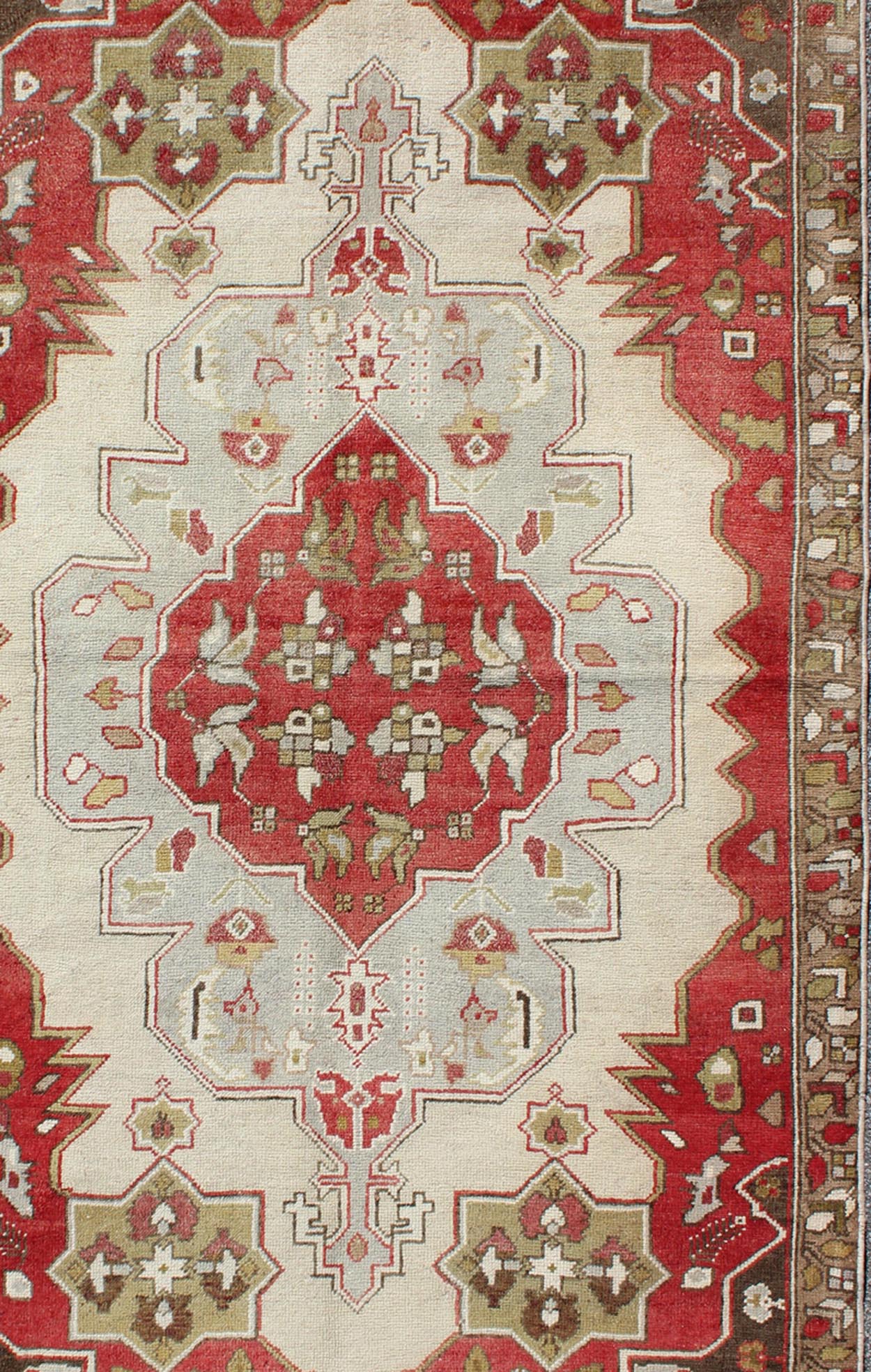 Layered medallion antique Turkish Oushak rug with red sub - geometric motifs Measures: 4'4 x 7'9 This vintage Turkish Oushak rug features an intricate geometric medallion design. The central medallion is surrounded by multi - layers in the fi... - Keivan Woven ArtsTU - TRS - 3600 - 7245Rug