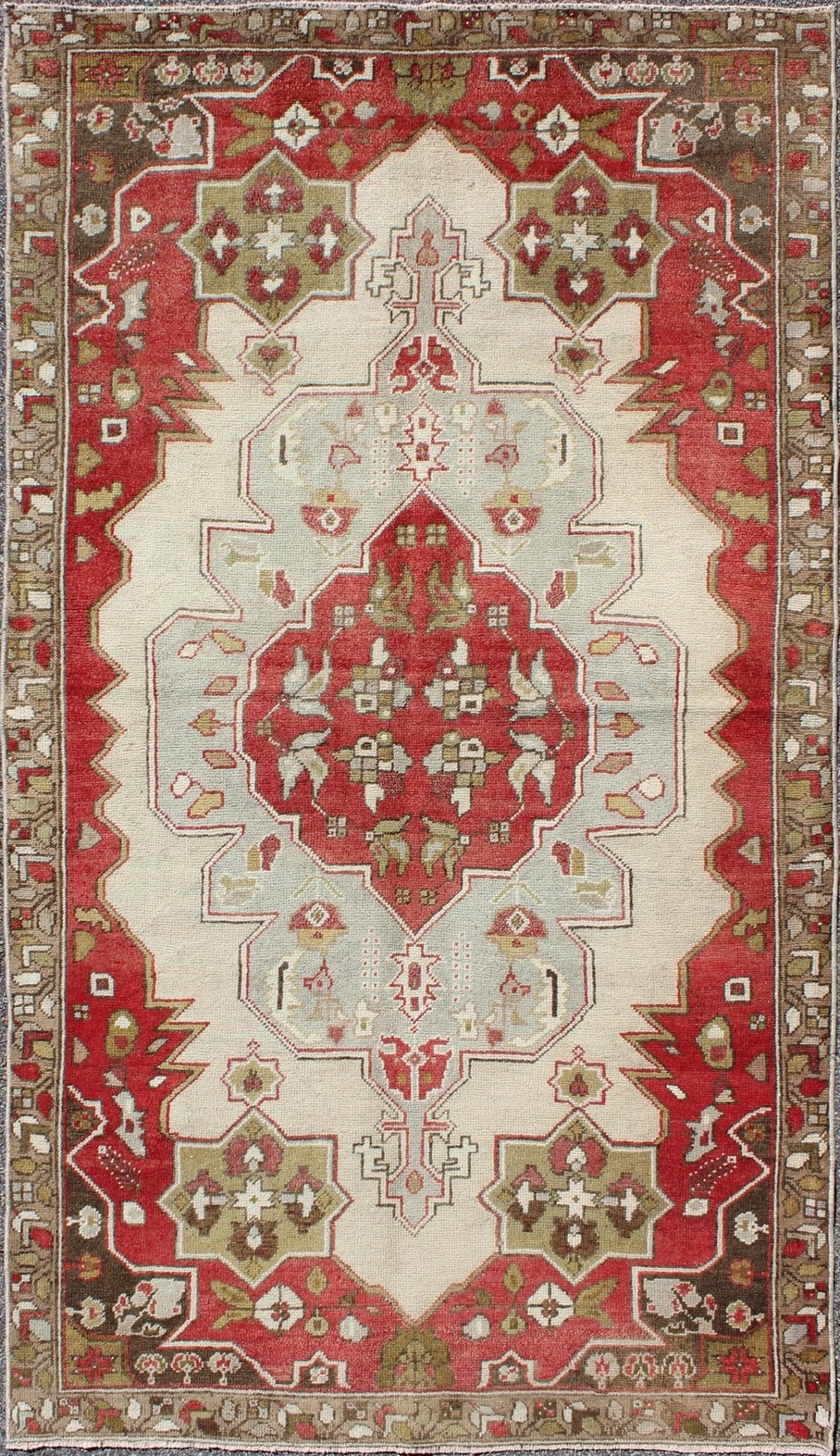 Layered medallion antique Turkish Oushak rug with red sub - geometric motifs Measures: 4'4 x 7'9 This vintage Turkish Oushak rug features an intricate geometric medallion design. The central medallion is surrounded by multi - layers in the fi... - Keivan Woven ArtsTU - TRS - 3600 - 7245Rug
