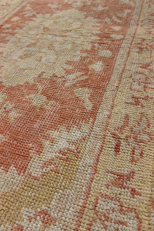 Antique Turkish Oushak Rug with Floral Motifs and Coral Background. Measures: 2'11'' x 5'5''. This Oushak runner features a unique blend of cheerful colors and an intricately beautiful design. The multi - layered diamond medallions are compleme... - Keivan Woven ArtsTU - TRS - 4641 - 7907Rug