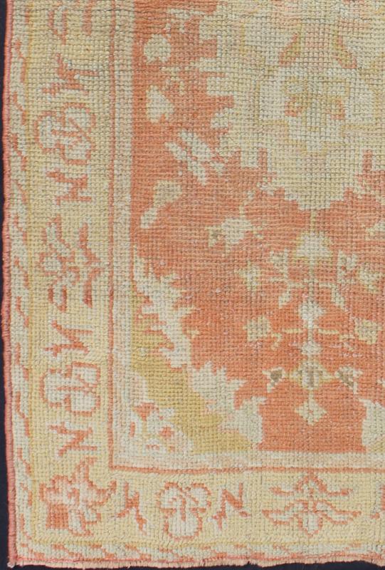 Antique Turkish Oushak Rug with Floral Motifs and Coral Background. Measures: 2'11'' x 5'5''. This Oushak runner features a unique blend of cheerful colors and an intricately beautiful design. The multi - layered diamond medallions are compleme... - Keivan Woven ArtsTU - TRS - 4641 - 7907Rug