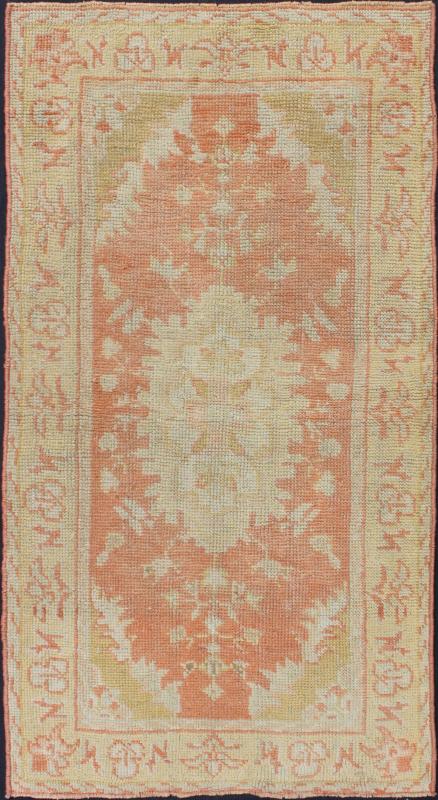 Antique Turkish Oushak Rug with Floral Motifs and Coral Background. Measures: 2'11'' x 5'5''. This Oushak runner features a unique blend of cheerful colors and an intricately beautiful design. The multi - layered diamond medallions are compleme... - Keivan Woven ArtsTU - TRS - 4641 - 7907Rug