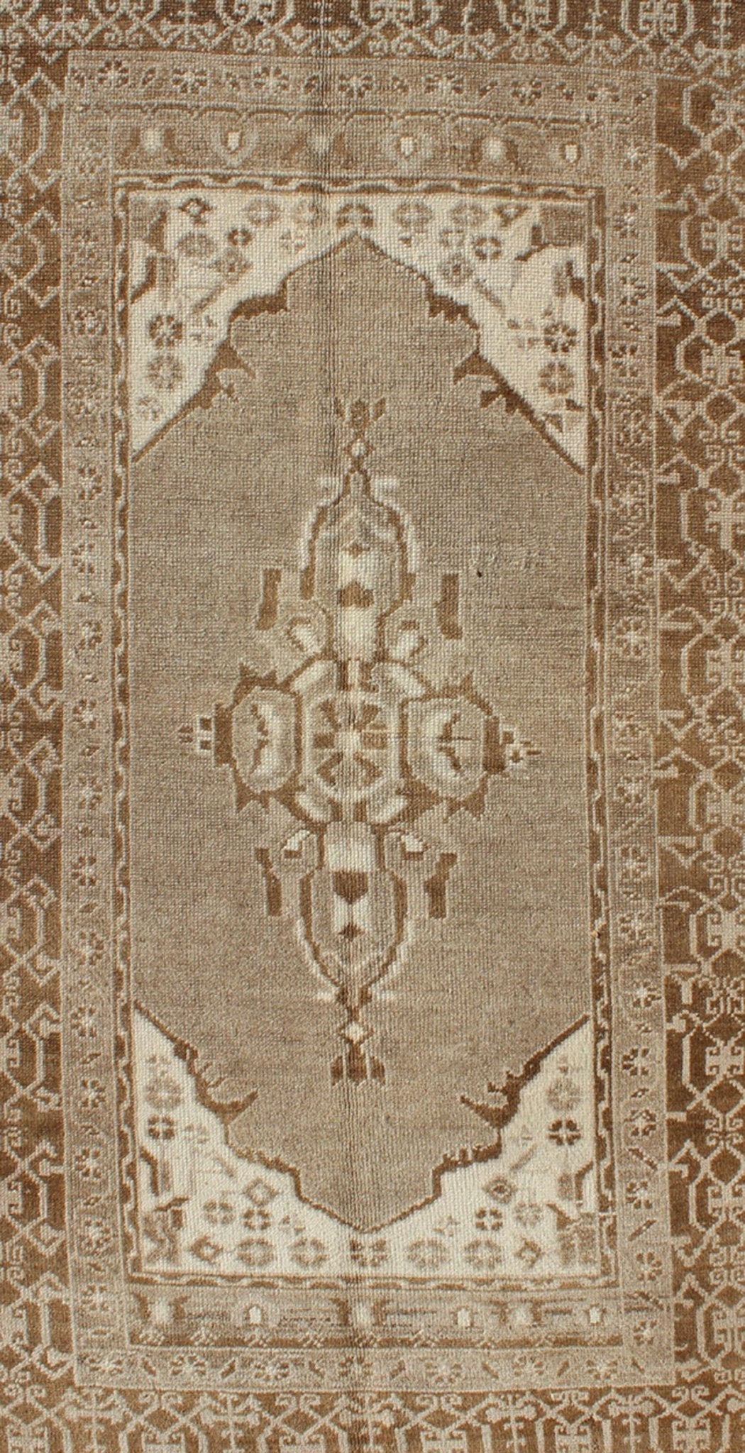 Vintage Turkish Medallion Oushak Area Rug in Grey and Brown's Measures: 3.10 x 6.10 Set amidst a taupe and gray background and featuring a gentle medallion, the beautiful and delicate design of this rug is framed by repeating geometric el... - Keivan Woven ArtsTU - TRS - 95020 - 3582Rug