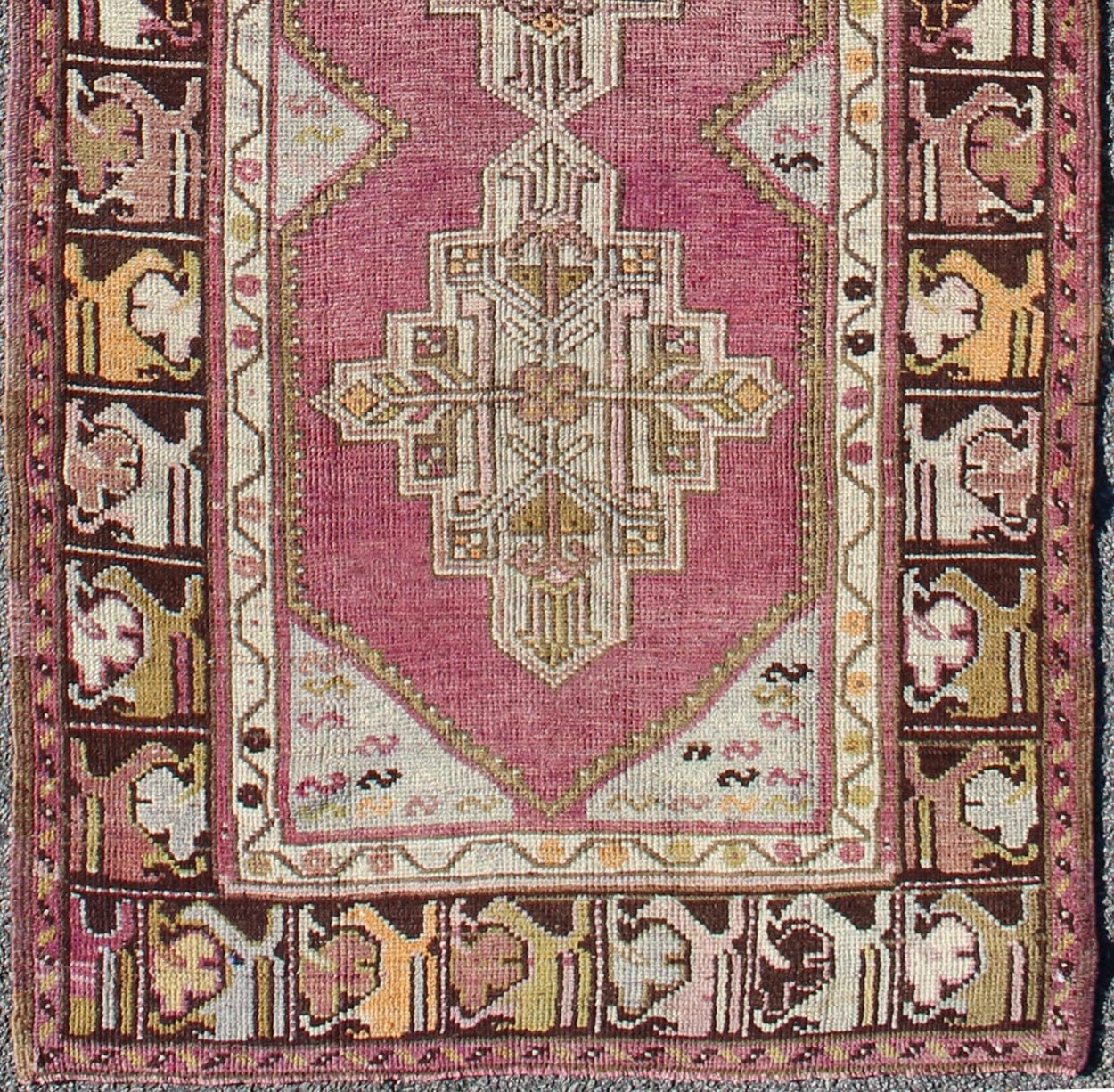 Vintage Oushak Runner This unusual Oushak bears a remarkable geometric design that is complemented by a delicately understated color palette. The purple background plays host to an intriguing display of muted geometric patterns in hues of pale a... - Keivan Woven ArtsTU - TRS - 95151 - 5040Rug