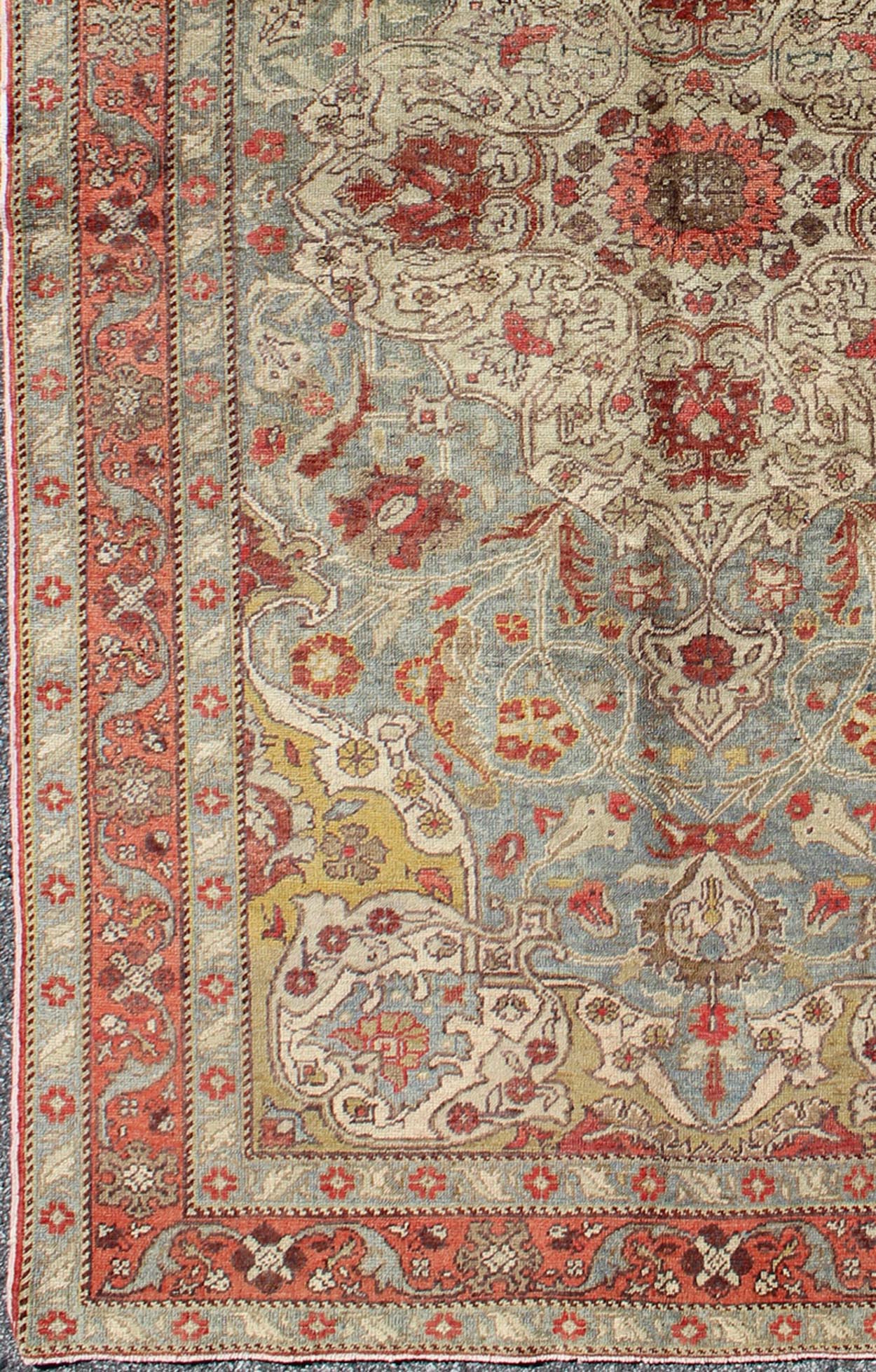 Floral medallion Antique Turkish Sivas rug in light blue, red, ivory, chartreuse, rug tu - trs - 95198, country of origin / type: Turkey / Oushak, circa 1930. This antique Turkish Oushak rug features an intricately beautiful design with a floral aes... - Keivan Woven ArtsTU - TRS - 95198 - 5044Rug
