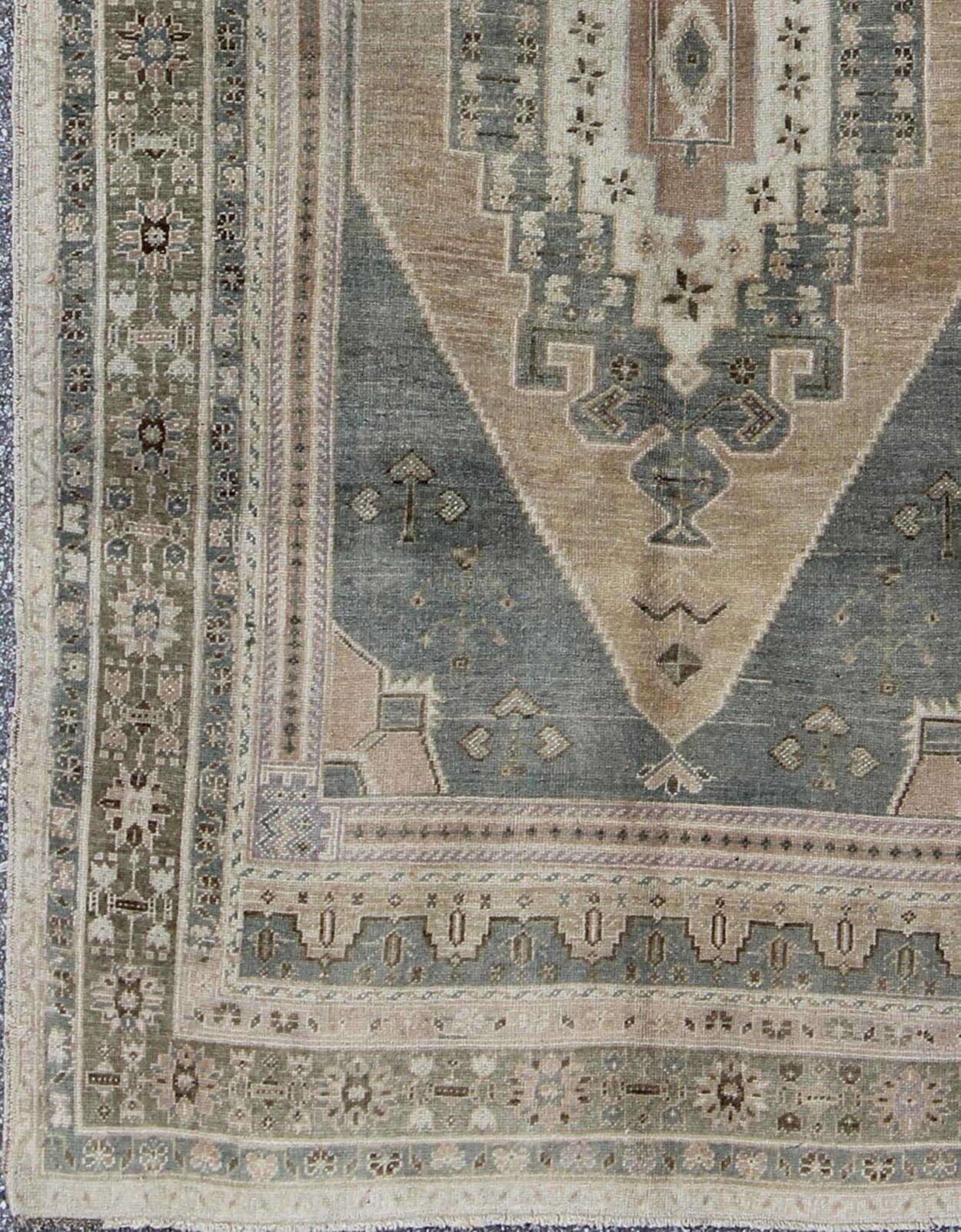 Vintage Oushak in Gray Green, Beige, Camel Background and Light Green Border . Vintage Oushak in Gray Green, Beige, Camel Background and Light Green Border. Rug / TU - UGU - 136007 This unique Turkish Oushak has a Gray green background along ... - Keivan Woven ArtsTU - UGU - 136007 - 4664Rug