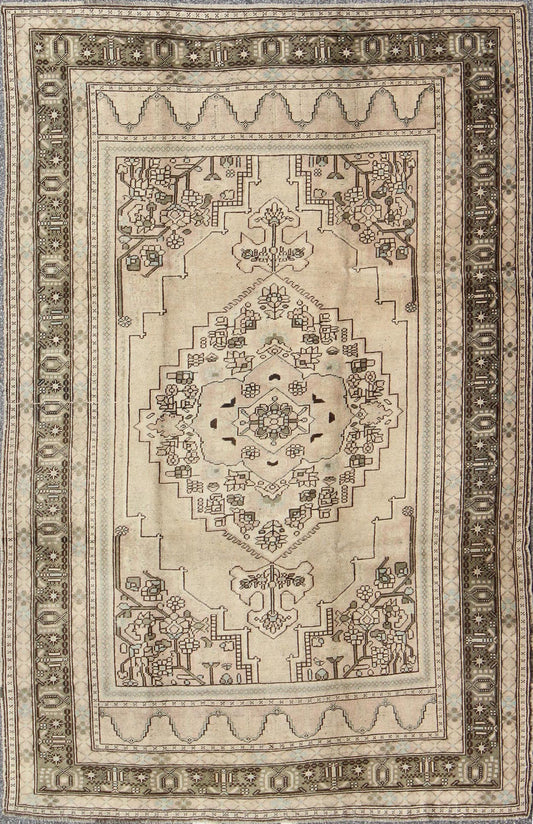 Vintage Turkish Oushak Rug with Center Medallion Design in Earthy Colors This striking vintage Turkish Oushak rug bears a neutral beige colored body that is highlighted by a dazzling design drawn in darker neutral earth tones. A large - scale med... - Keivan Woven ArtsTU - UGU - 136012 - 4680Rug