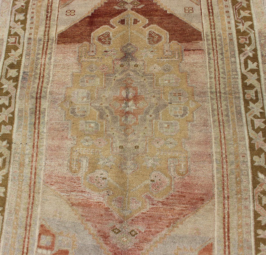 Vintage Turkish Oushak with Large Central Medallion in Cream, Yellow, Brown and Red. Keivan Woven Arts/ rug/TU - UGU - 136095, origin/turkey Measures: 3'7 x 5'8. This vintage Oushak rug features an intricately beautiful design. The central ... - Keivan Woven ArtsTU - UGU - 136095 - 4690