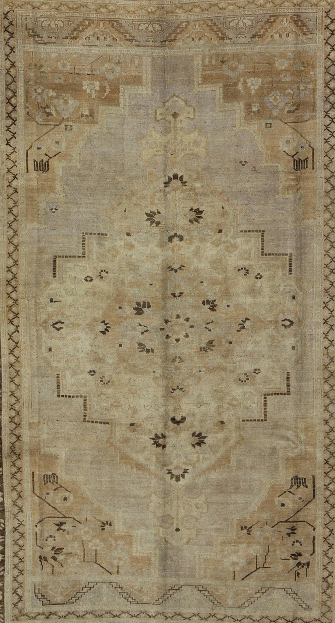 Vintage Turkish Floral Medallion Oushak Area Rug in Tan, Brown and Beige Measures: 7'11 x 11'5 This Vintage Turkish Oushak, from 1940s Turkey, featuring a chocolate brown border with connecting flower and vines. The sandy field combines ... - Keivan Woven ArtsTU - UGU - 14 - 3100Rug