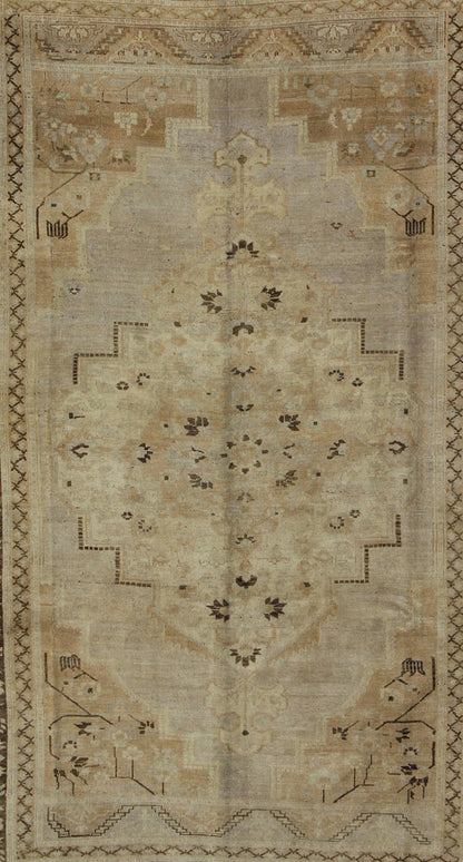 Vintage Turkish Floral Medallion Oushak Area Rug in Tan, Brown and Beige Measures: 7'11 x 11'5 This Vintage Turkish Oushak, from 1940s Turkey, featuring a chocolate brown border with connecting flower and vines. The sandy field combines ... - Keivan Woven ArtsTU - UGU - 14 - 3100Rug