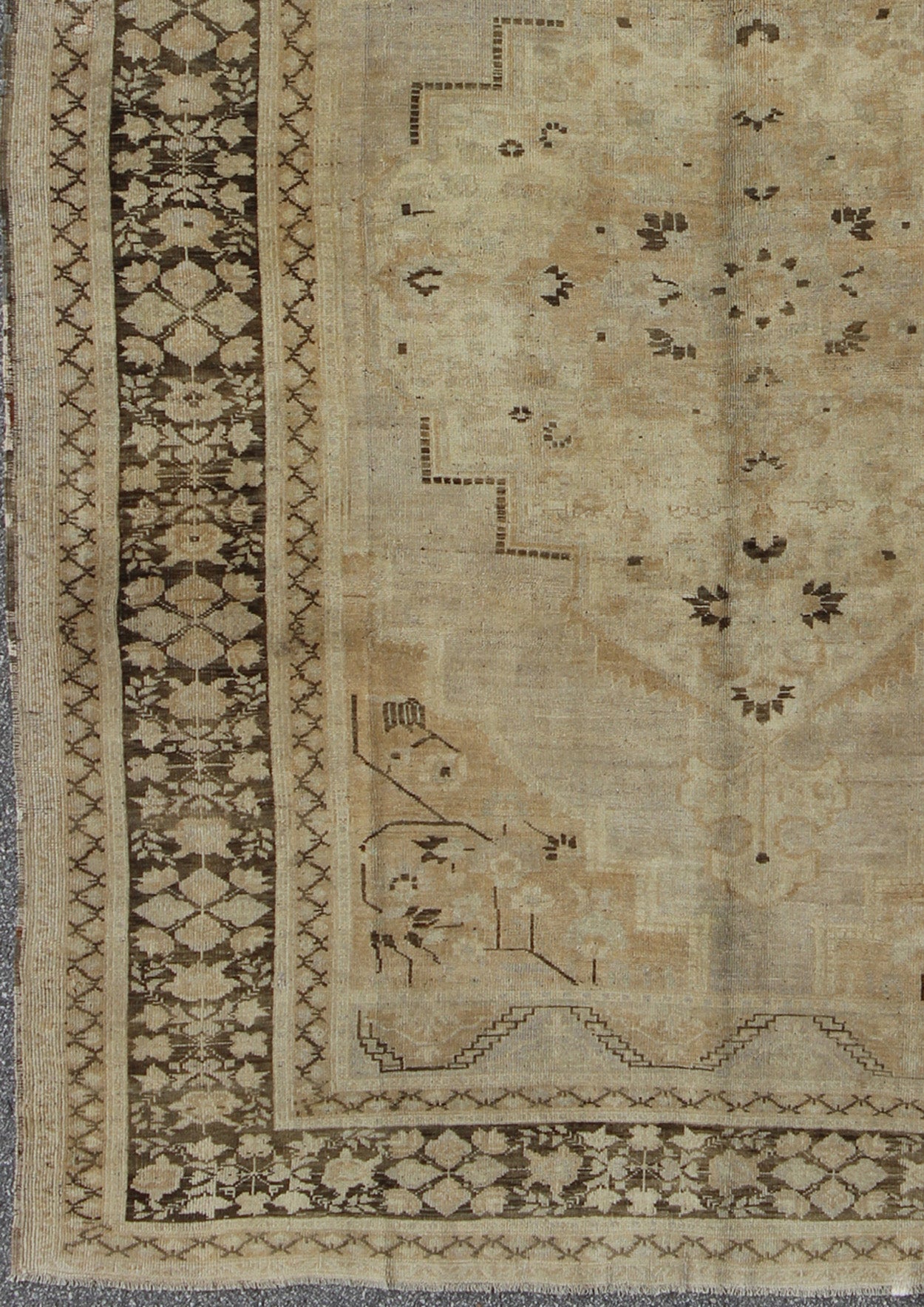 Vintage Turkish Floral Medallion Oushak Area Rug in Tan, Brown and Beige Measures: 7'11 x 11'5 This Vintage Turkish Oushak, from 1940s Turkey, featuring a chocolate brown border with connecting flower and vines. The sandy field combines ... - Keivan Woven ArtsTU - UGU - 14 - 3100Rug