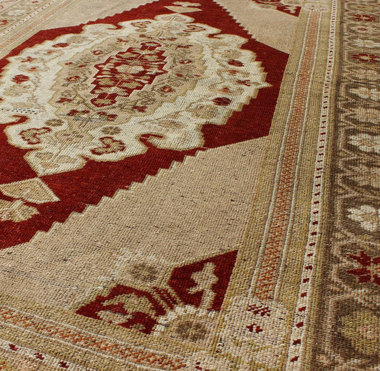 Vintage Turkish Layered Medallion Oushak Rug in Dark Red and Neutrals Measures: 4'10 x 7'4 This vintage, midcentury Turkish Oushak rug features an intricately beautiful design with a traditional aesthetic. The central medallion is surro... - Keivan Woven ArtsTU - UGU - 21 - 2830Rug