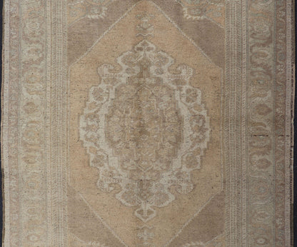 Muted Colors Vintage Turkish Oushak Rug with Medallion Design in Lt. Green. Muted vintage Turkish Oushak rug with large medallion design in light green, gray, light salmon and rust, Camel and taupe, rug tu - ugu - 32, country of origin / type: Turkey /... - Keivan Woven ArtsTU - UGU - 32 - 2946Rug