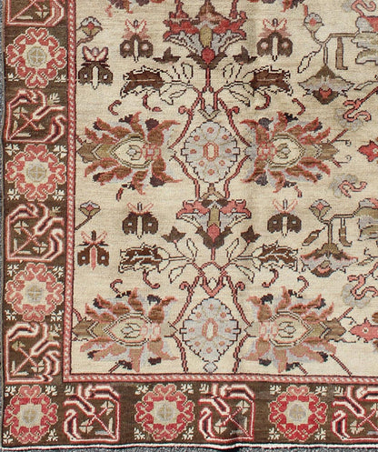 Vintage Oushak Rug from Turkey with All - Over Floral Design in Ivory, Brown & Red Produced in mid - 20th century Turkey, this antique Oushak is characterized by a comely and highly representative Oushak composition. Building on traditional designs,... - Keivan Woven ArtsTU - UGU - 3387 - 6223Rug