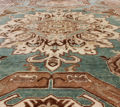 Vintage Hand Knotted Turkish Carpet With Geometric Tribal Medallion Design Geometric design rug in brown, turquoise, taupe, and ivory, Keivan Woven Arts / rug tu - ugu - 3402, country of origin / type: Turkey / Oushak, circa 1940 Set on a uni... - Keivan Woven ArtsTU - UGU - 3402 - 5906Rug