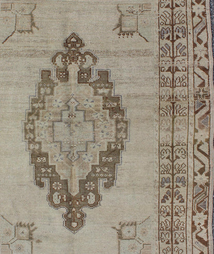 Brown and Taupe Colored Vintage Turkish Oushak Rug with Medallion Design. Stylized Floral Medallion design vintage Oushak rug from Turkey, rug tu - ugu - 35, country of origin / type: Turkey / Oushak, circa 1940 Brown and taupe colored vintage Turki... - Keivan Woven ArtsTU - UGU - 35 - 3110Rug