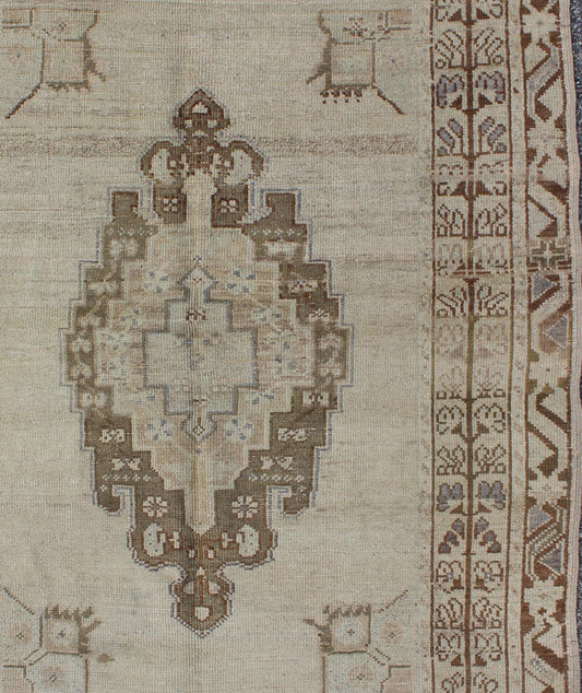 Brown and Taupe Colored Vintage Turkish Oushak Rug with Medallion Design. Stylized Floral Medallion design vintage Oushak rug from Turkey, rug tu - ugu - 35, country of origin / type: Turkey / Oushak, circa 1940 Brown and taupe colored vintage Turki... - Keivan Woven ArtsTU - UGU - 35 - 3110Rug
