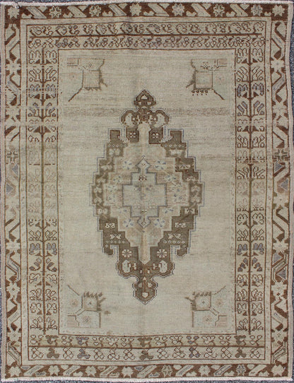 Brown and Taupe Colored Vintage Turkish Oushak Rug with Medallion Design. Stylized Floral Medallion design vintage Oushak rug from Turkey, rug tu - ugu - 35, country of origin / type: Turkey / Oushak, circa 1940 Brown and taupe colored vintage Turki... - Keivan Woven ArtsTU - UGU - 35 - 3110Rug