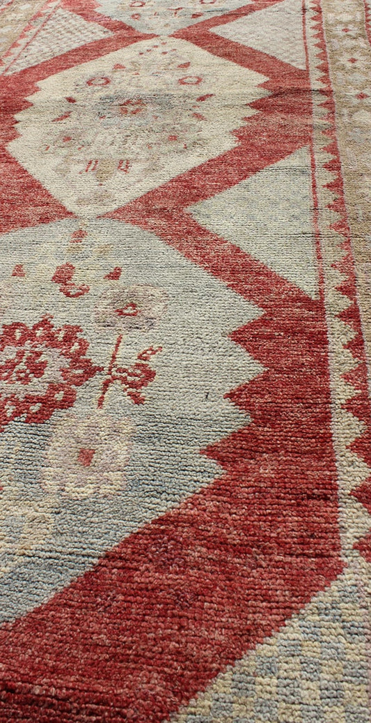 Vintage Turkish Oushak Medallion Runner in Soft Red, Lt. Blue, Cream Measures: 3'8'' x 9'7'' This beautiful vintage Oushak runner from 1930s Turkey features a Classic Oushak design, which is enhanced by its lustrous wool. The rich red gro... - Keivan Woven ArtsTU - UGU - 3601 - 6937Rug