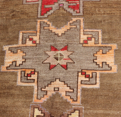 Unique & Colorful Turkish Kars Runner with Tribal Designs and Geometric Motifs Vintage Turkish runner in greenish Brown background, ivory border with accent colors, red, pink, tan, green, bright yellow, taupe, rug/TU - UGU - 4806, country of origin... - Keivan Woven ArtsTU - UGU - 4806 - 10287Rug