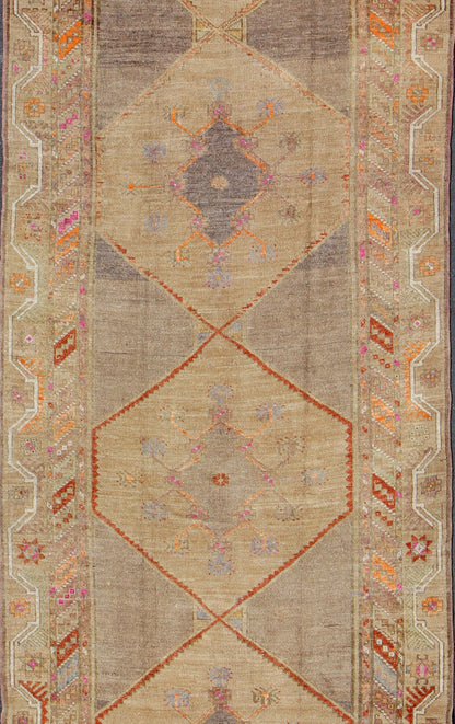 Colorful Turkish Gallery Runner with Multi - Medallion Design & Unique Colors. Vintage Oushak Rug from Turkey with Tribal Geometric Design, rug TU - UGU - 4807, country of origin / type: Turkey / Oushak, circa 1930 This Turkish carpet from 2n... - Keivan Woven ArtsTU - UGU - 4807 - 10293Rug