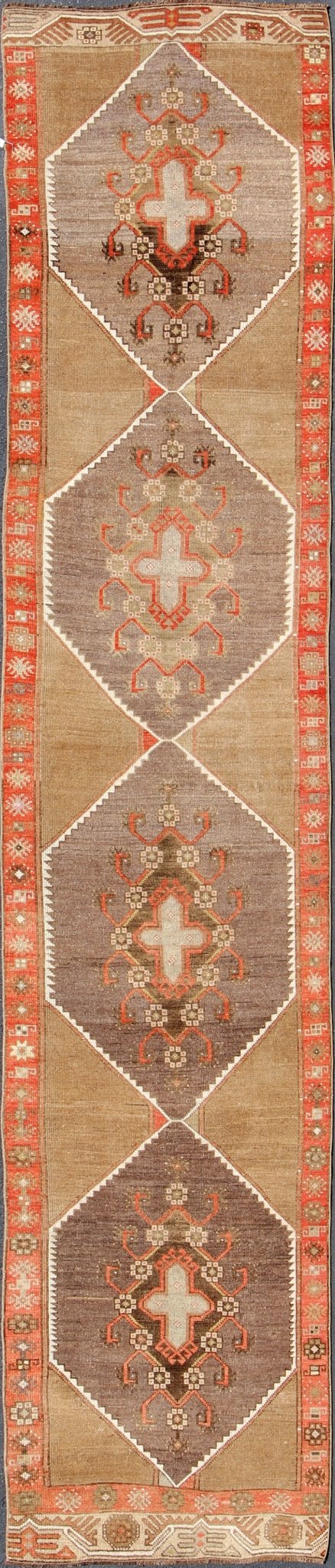 Colorful Vintage Turkish Runner with Diamond Medallions in Lt. Camel, orange and Gray Long and narrow vintage runner from Turkey with multi geometric diamond medallion design in camel background, rust, gray, orange, brown and taupe. rug/TU - UGU... - Keivan Woven ArtsTU - UGU - 4808 - 10297Rug