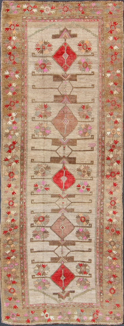Vintage Unique Oushak Runner with Tribal Designs and Geometric Motifs kwarugs Vintage Turkish runner in red, pink, beige, tan, green, bright lavender, taupe, rug tu - ugu - 4809, country of origin / type: Turkey / Oushak, circa 1950 This... - Keivan Woven ArtsTU - UGU - 4809 - 10301Rug