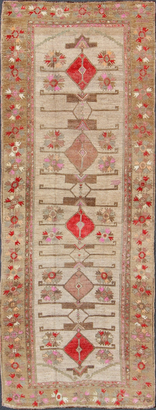 Vintage Unique Oushak Runner with Tribal Designs and Geometric Motifs kwarugs Vintage Turkish runner in red, pink, beige, tan, green, bright lavender, taupe, rug tu - ugu - 4809, country of origin / type: Turkey / Oushak, circa 1950 This... - Keivan Woven ArtsTU - UGU - 4809 - 10301Rug
