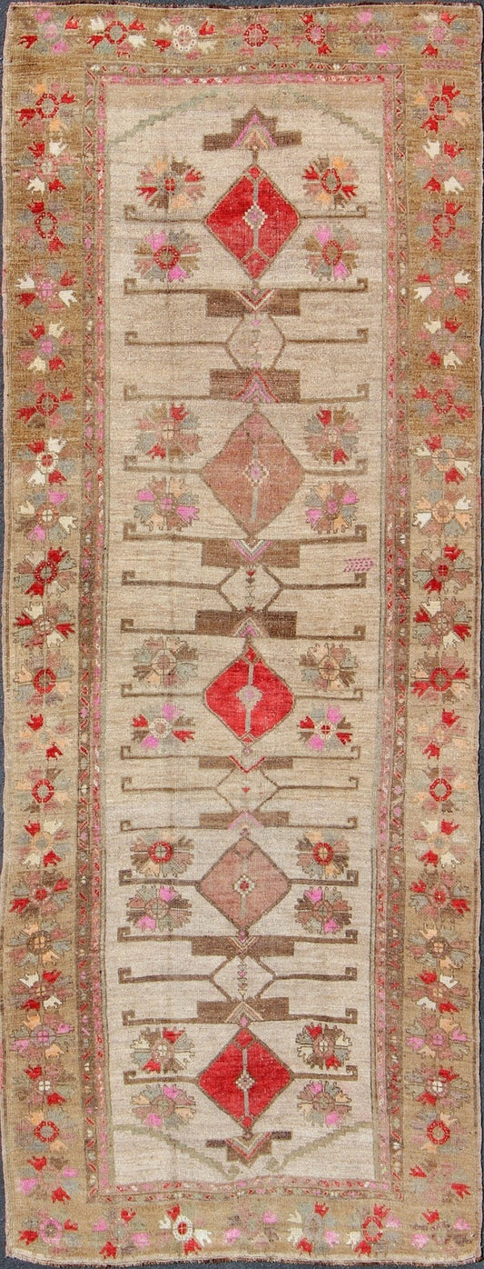 Vintage Unique Oushak Runner with Tribal Designs and Geometric Motifs kwarugs Vintage Turkish runner in red, pink, beige, tan, green, bright lavender, taupe, rug tu - ugu - 4809, country of origin / type: Turkey / Oushak, circa 1950 This... - Keivan Woven ArtsTU - UGU - 4809 - 10301
