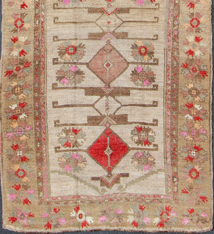 Vintage Unique Oushak Runner with Tribal Designs and Geometric Motifs kwarugs Vintage Turkish runner in red, pink, beige, tan, green, bright lavender, taupe, rug tu - ugu - 4809, country of origin / type: Turkey / Oushak, circa 1950 This... - Keivan Woven ArtsTU - UGU - 4809 - 10301Rug