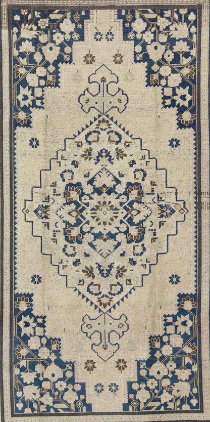 Vintage Turkish Oushak Rug with Medium Blue, Brown and Cream Colors. Vintage Turkish Oushak rug, Rug TU - UGU - 54, country of origin / type: Turkey / Oushak, circa mid - 20th century. This exquisite vintage Turkish Oushak features a star medal... - Keivan Woven ArtsTU - UGU - 54 - 2848Rug