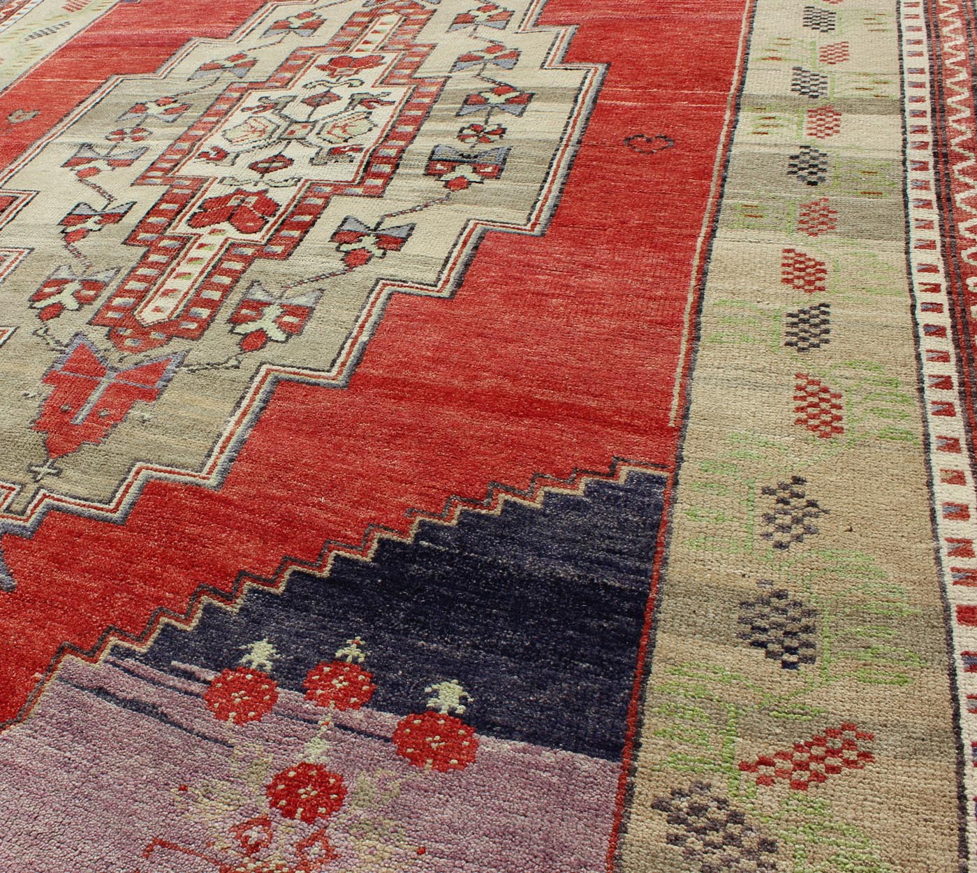 Vintage Turkish Tribal Medallion Oushak in Red, Champagne, Lilac and Navy Blue Measures: 5.4 x 7.9 This beautiful rug from mid - 20th century Turkey features a classic Oushak design, large scale medallion in the field, rendered in red, cha... - Keivan Woven ArtsTU - UGU - 95165 - 4650Rug