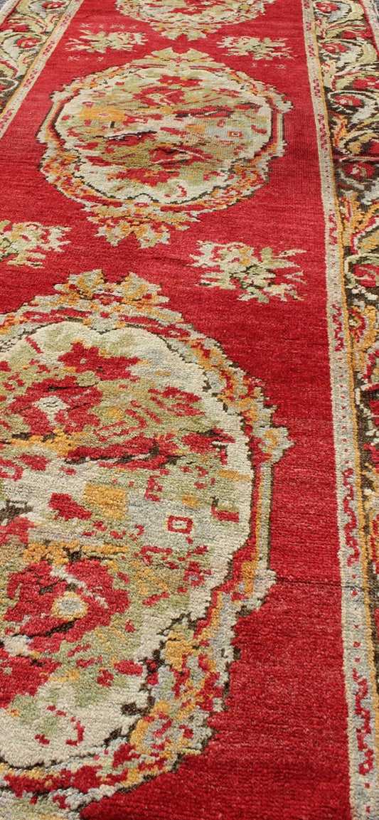 Rich red antique Turkish Oushak runner with three ornate floral medallions Measures: 3'6 x 11' Country of Origin: Turkey; Type: Oushak; Design: Floral Medallion, All - Over; Keivan Woven Arts: rug tu - umi - 1902; Rich red antique Turkish Ousha... - Keivan Woven ArtsTU - UMI - 1902 - 2007