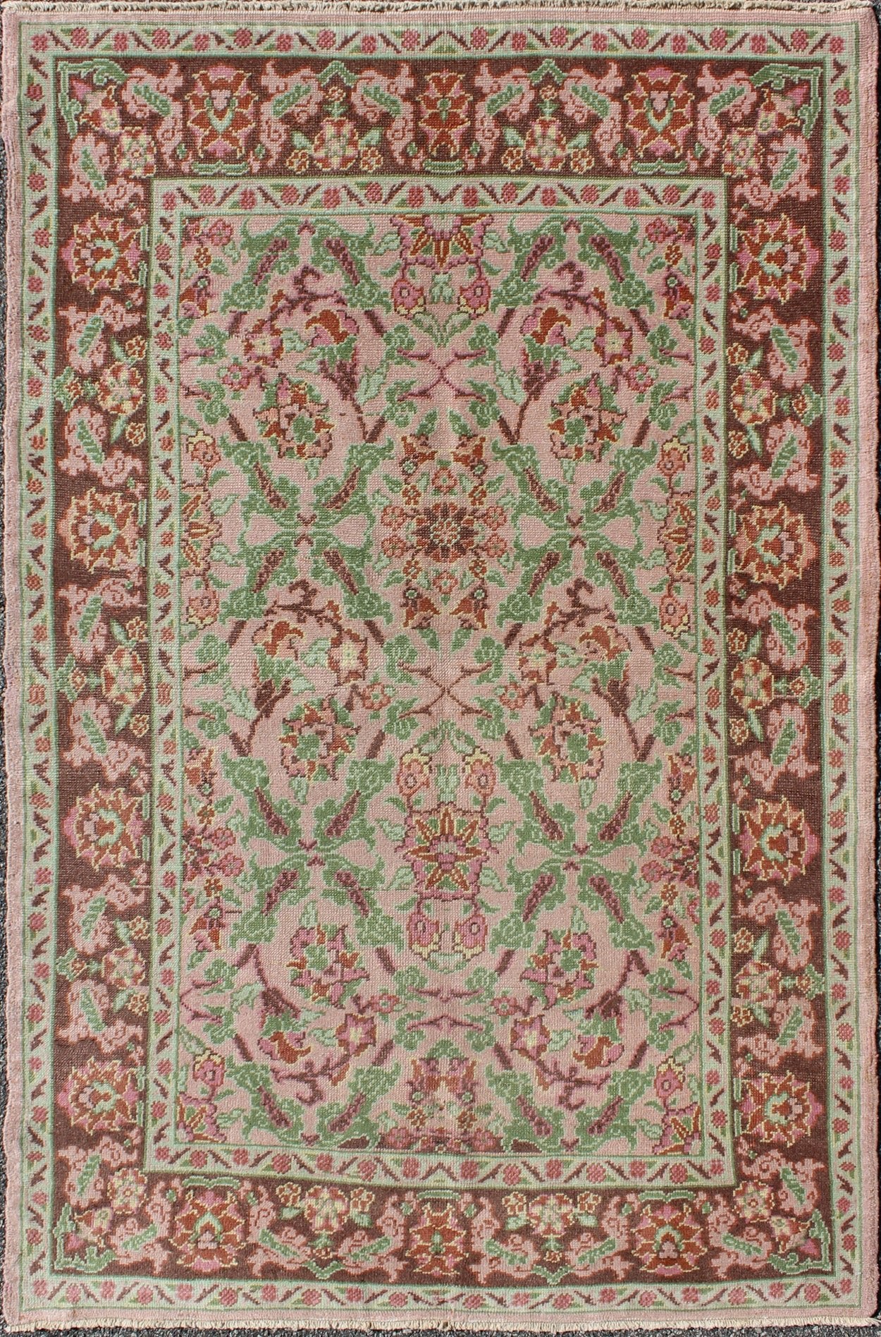 Pink, Rose, and Green Floral Design Midcentury Vintage Turkish Oushak Area Rug Measures: 4'1 x 6'7 Set on a light pink field with an all - over pattern, this beautiful midcentury Turkish Oushak rug (circa 1940) features cross - latch an... - Keivan Woven ArtsTU - VEY - 136611 - 9226