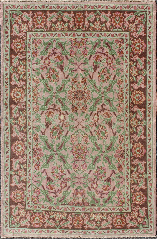 Pink, Rose, and Green Floral Design Midcentury Vintage Turkish Oushak Area Rug Measures: 4'1 x 6'7 Set on a light pink field with an all - over pattern, this beautiful midcentury Turkish Oushak rug (circa 1940) features cross - latch an... - Keivan Woven ArtsTU - VEY - 136611 - 9226