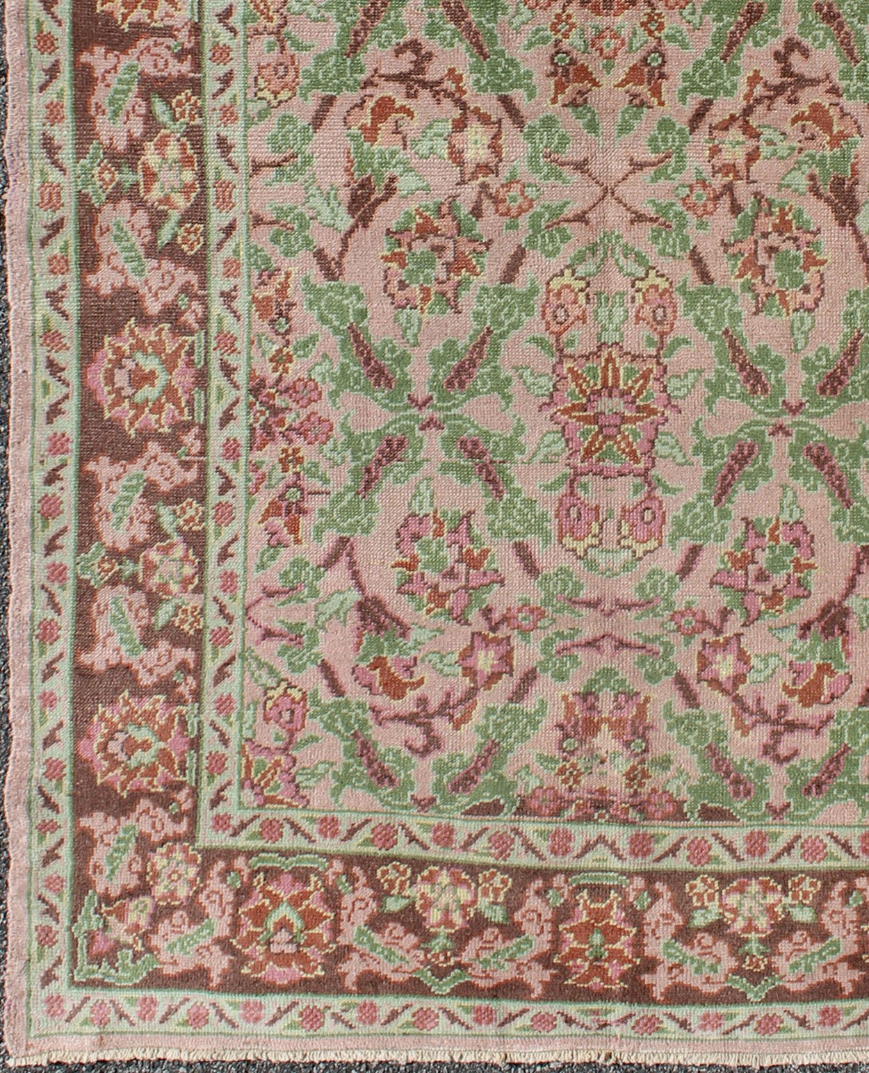 Pink, Rose, and Green Floral Design Midcentury Vintage Turkish Oushak Area Rug Measures: 4'1 x 6'7 Set on a light pink field with an all - over pattern, this beautiful midcentury Turkish Oushak rug (circa 1940) features cross - latch an... - Keivan Woven ArtsTU - VEY - 136611 - 9226