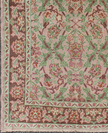 Pink, Rose, and Green Floral Design Midcentury Vintage Turkish Oushak Area Rug Measures: 4'1 x 6'7 Set on a light pink field with an all - over pattern, this beautiful midcentury Turkish Oushak rug (circa 1940) features cross - latch an... - Keivan Woven ArtsTU - VEY - 136611 - 9226