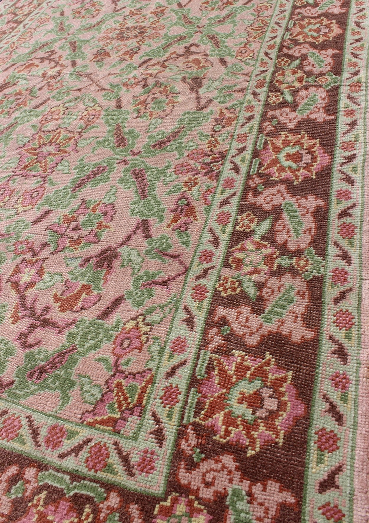 Pink, Rose, and Green Floral Design Midcentury Vintage Turkish Oushak Area Rug Measures: 4'1 x 6'7 Set on a light pink field with an all - over pattern, this beautiful midcentury Turkish Oushak rug (circa 1940) features cross - latch an... - Keivan Woven ArtsTU - VEY - 136611 - 9226