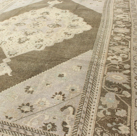 Nude, taupe, and brown medallion design Turkish vintage Oushak rug, rug tu - vey - 3281, country of origin / type: Turkey / Oushak, circa 1940. This striking vintage Turkish Oushak rug bears a brown - colored body that is highlighted by a dazzling med... - Keivan Woven ArtsTU - VEY - 3281 - 6241Rug